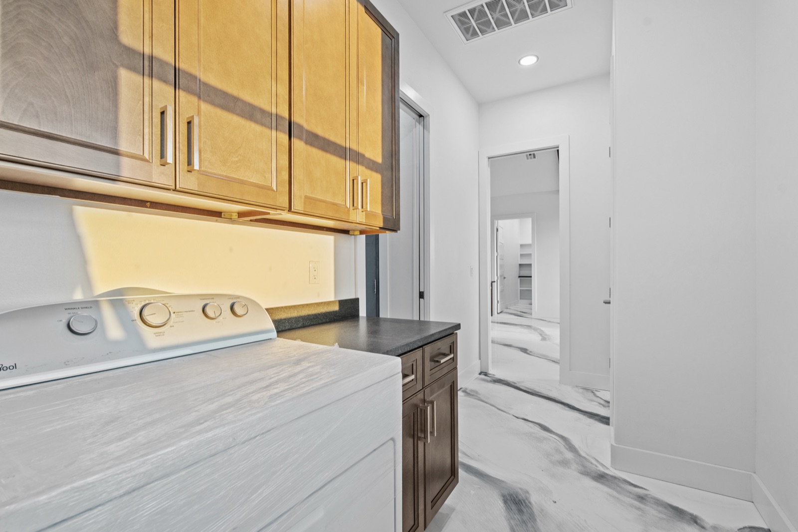Laundry room with custom cabinetry